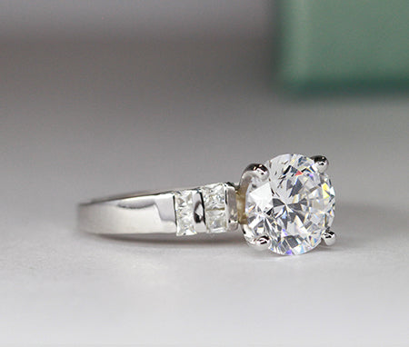 Carnation Round Moissanite Engagement Ring whitegold